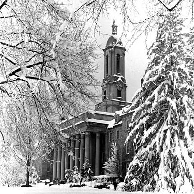 Old Main in Snow - Black and White Campus Photo